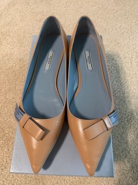 Prada Beige Pointed-Toe Leather Flats with Bow Accent